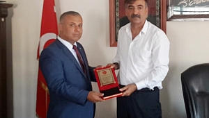 BAŞARI PLAKETLE TAÇLANDI 