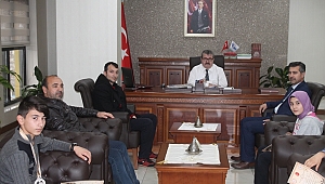 ŞAMPİYONLARDAN, ONİKİŞUBAT KAYMAKAMINA ZİYARET 