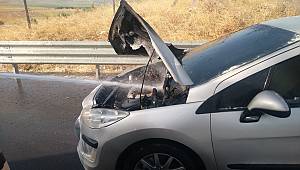 Seyir halinde yanan otomobilin imdadına beton mikseri yetişti 