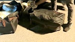 Osmaniye’de otomobil valizinden 76 kilogram esrar ele geçirildi 