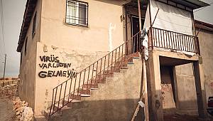 Testi pozitif çıktı evinin duvarına, ‘Virüs var lütfen gelmeyin’ yazdı 