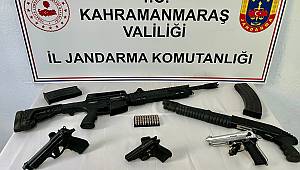 Maganda bagaj dolusu silahla yakalandı