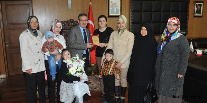 DOWN SENDROMU ÇOCUKLAR DERNEĞİNDEN BAŞKANA PLAKET